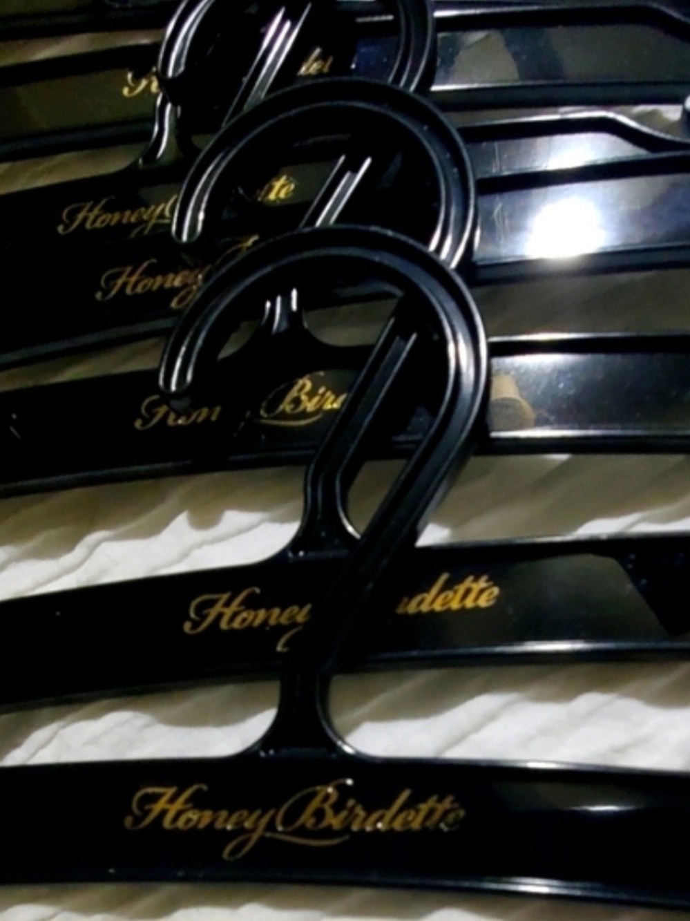 Honey Birdette Black and Gold Branded Hangers (x27)